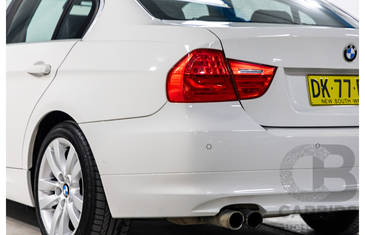 9/2010 BMW 325i Exclusive E90 MY10 4d Sedan Alpine White 2.5L