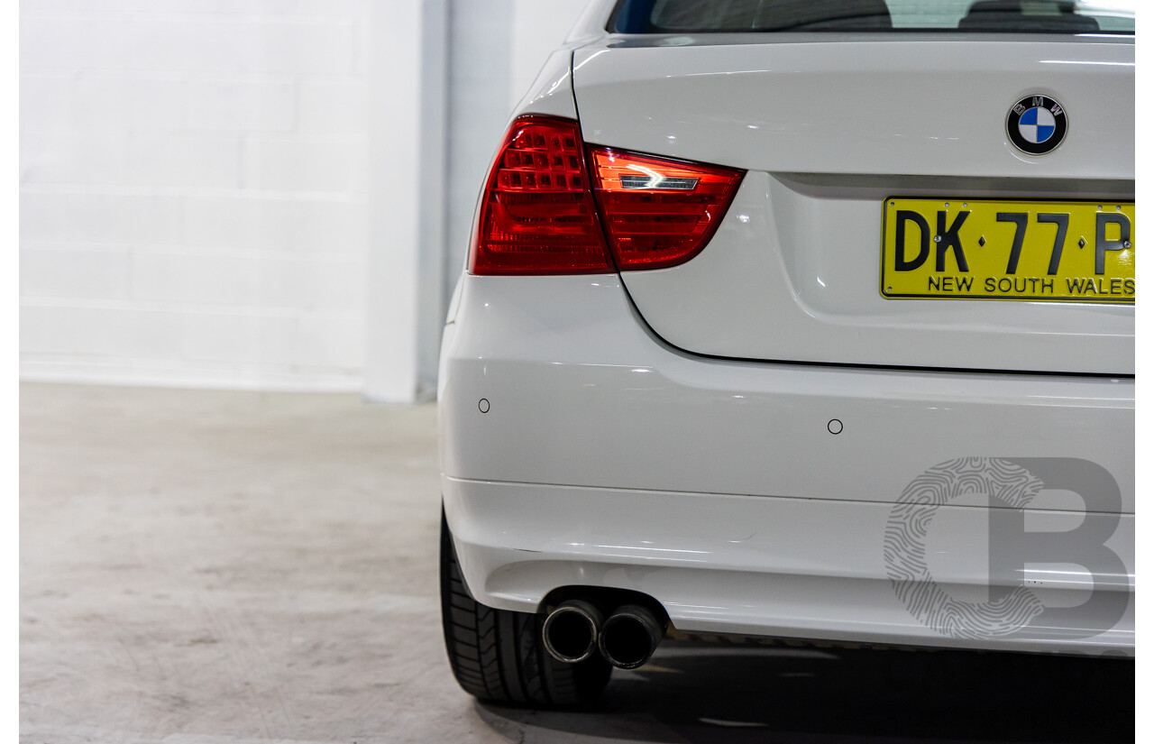 9/2010 BMW 325i Exclusive E90 MY10 4d Sedan Alpine White 2.5L
