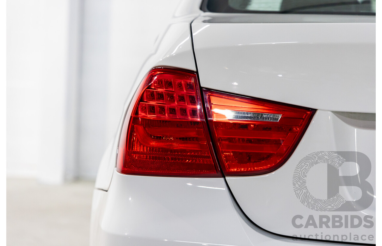 9/2010 BMW 325i Exclusive E90 MY10 4d Sedan Alpine White 2.5L