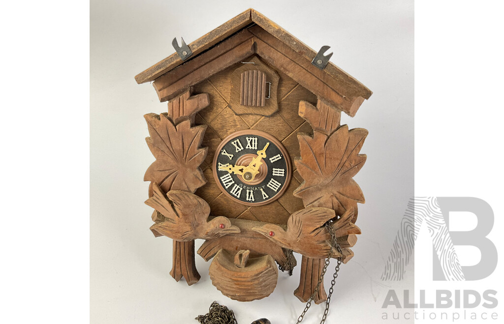 Vintage German Bird Themed Cuckoo Clock with Carved Birds and Hatchling