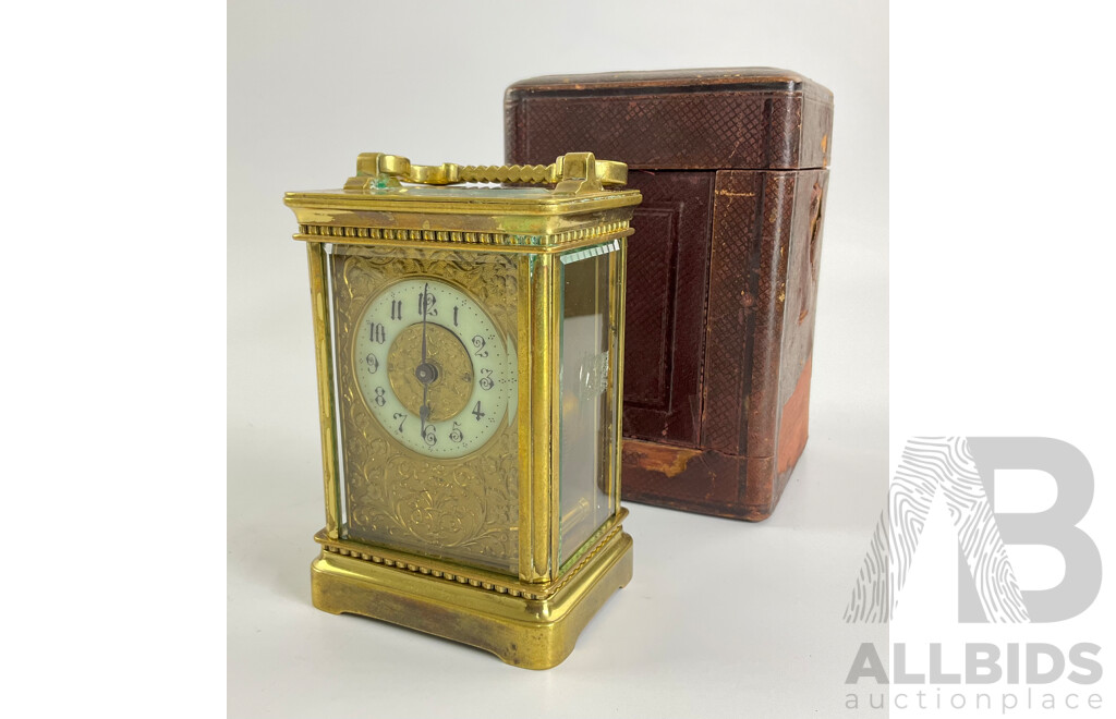 Antique Brass Traveling Clock, Ornate Floral Design with Beveled Glass and Case