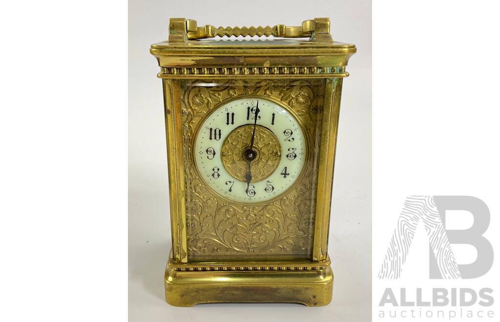 Antique Brass Traveling Clock, Ornate Floral Design with Beveled Glass and Case