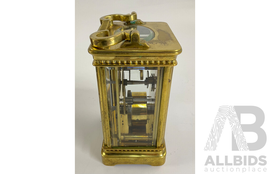 Antique Brass Traveling Clock, Ornate Floral Design with Beveled Glass and Case