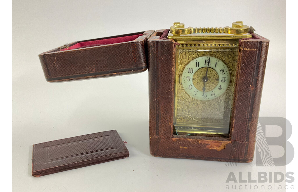 Antique Brass Traveling Clock, Ornate Floral Design with Beveled Glass and Case