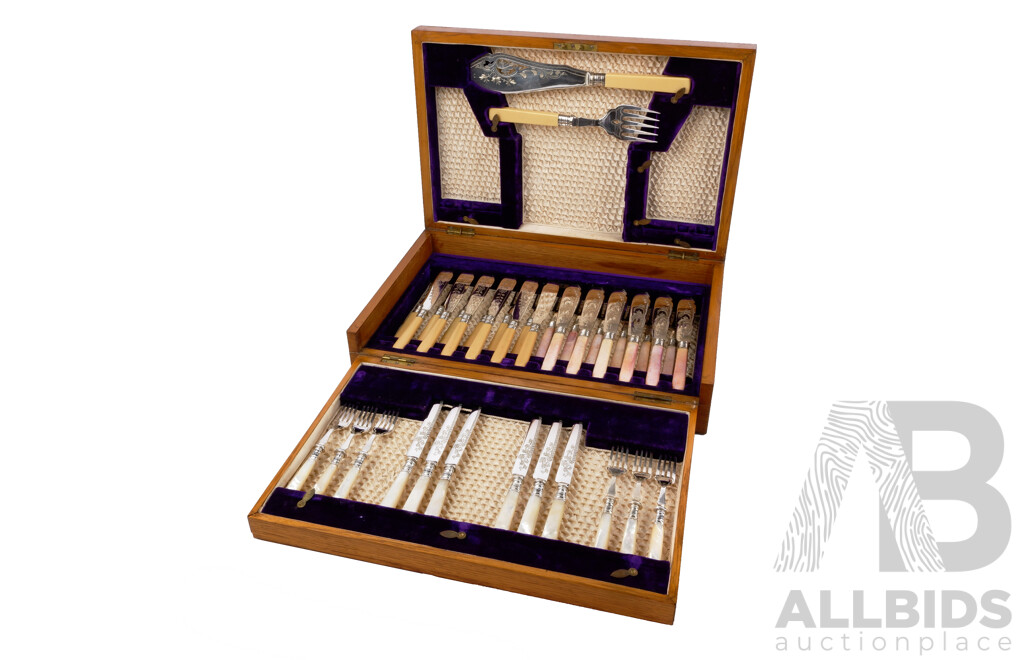 Fantastic Antique Oak Flatware Fold Out Canteen with 38 Piece Marriage Fish Cutlery Set with Sterling Silver Ferules and Silver Plate Heavily Engraved Blades