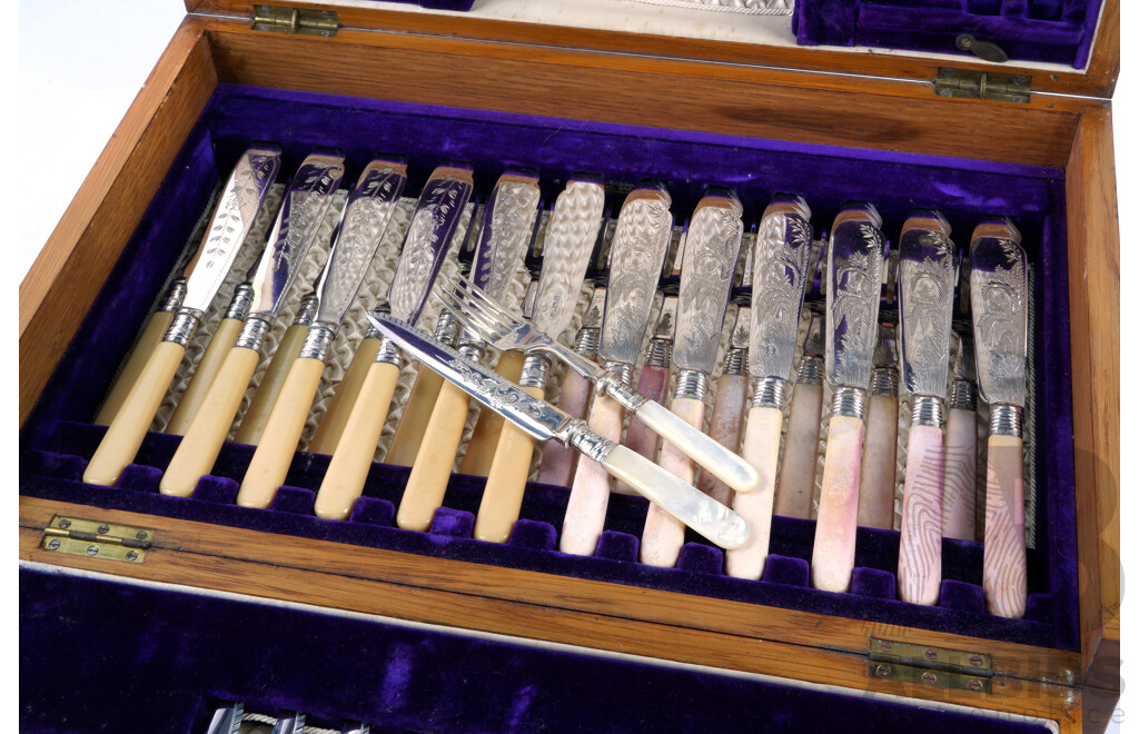 Fantastic Antique Oak Flatware Fold Out Canteen with 38 Piece Marriage Fish Cutlery Set with Sterling Silver Ferules and Silver Plate Heavily Engraved Blades