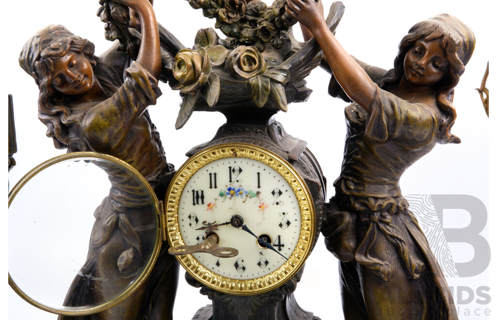 Antique Italian Spelter Chiming Mantle Clock with Neo Classical Theme on Onyx Bases with Two Female Figures and Cherub, After Geo Maxim, Pair Garniture Urns with Floral Garlands, Porcelain Floral Face, Later Movement