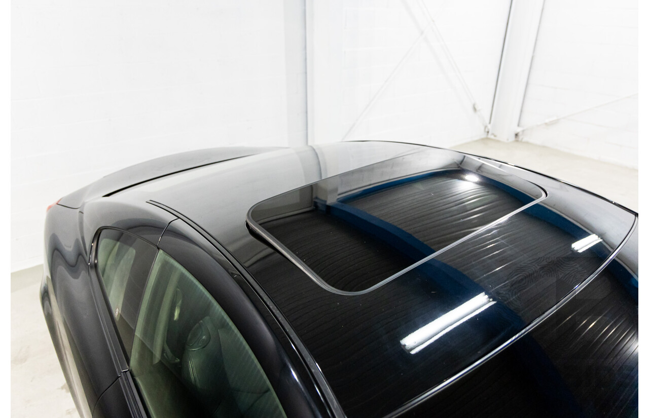 04/2016 Infiniti Q60 3.7 GT Premium (RWD) 2d Coupe Obsidian Black Metallic 3.7L