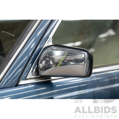 7/1984 Mercedes Benz 230 E W123 4d Sedan Blue 2.3L