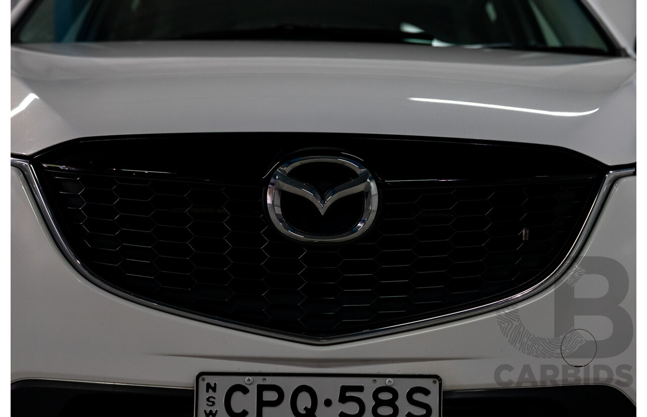 9/2013 Mazda CX-5 Maxx Sport (4x4) MY13.5 4d Wagon Crystal White Pearl Turbo Diesel 2.2L