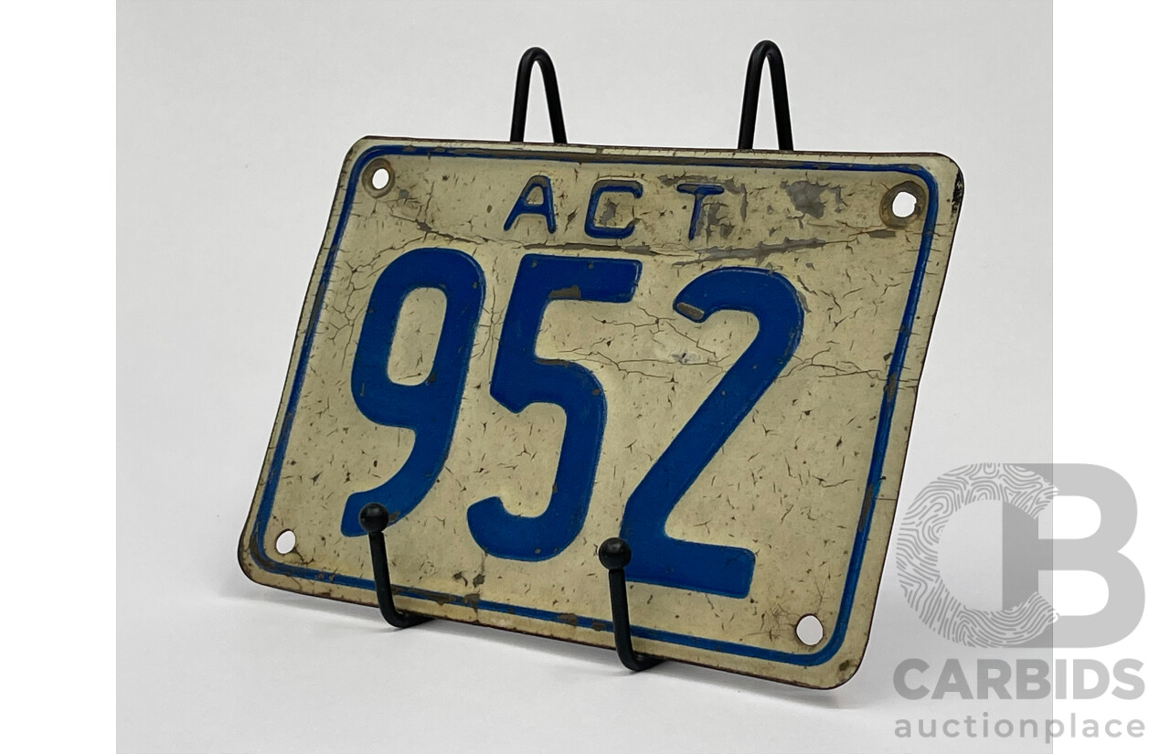 license plate with triple numbers on a car