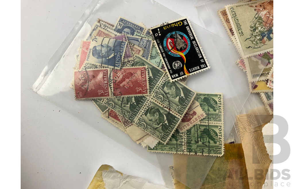 Collection of International Stamps Including Australian Predecimal, Royaume Du Laos, Phillipines, Canada and More