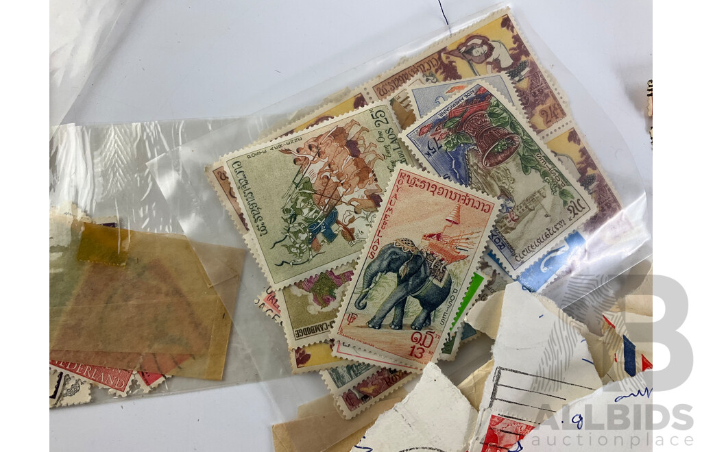 Collection of International Stamps Including Australian Predecimal, Royaume Du Laos, Phillipines, Canada and More