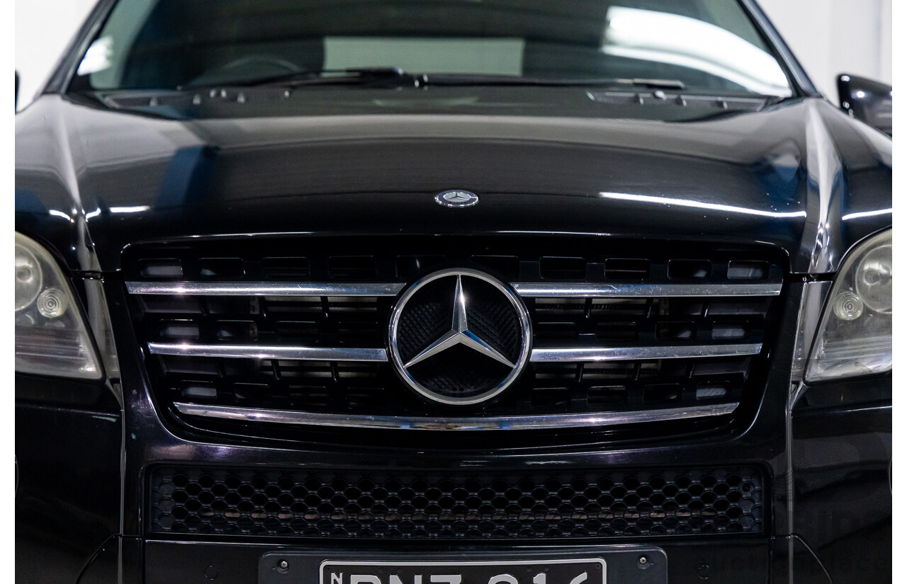 3/2011 Mercedes-Benz ML 300 CDI BlueEfficiency AMG Sports (4x4) 164 MY11 4d Wagon Obsidian Black Metallic Turbo Diesel 3.0L