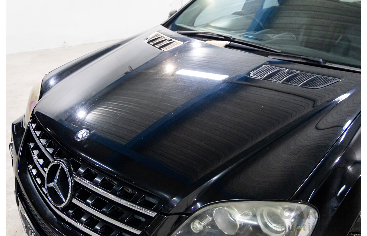 3/2011 Mercedes-Benz ML 300 CDI BlueEfficiency AMG Sports (4x4) 164 MY11 4d Wagon Obsidian Black Metallic Turbo Diesel 3.0L