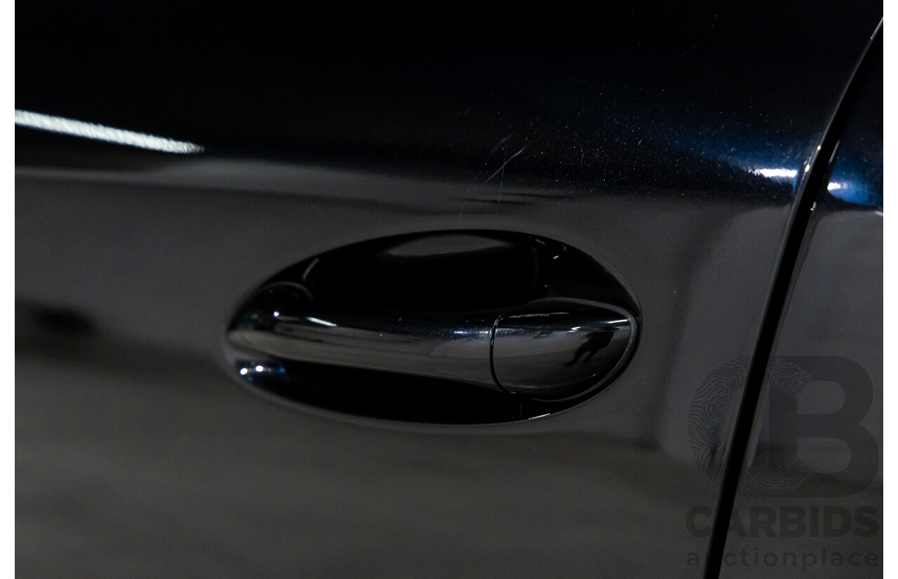 3/2011 Mercedes-Benz ML 300 CDI BlueEfficiency AMG Sports (4x4) 164 MY11 4d Wagon Obsidian Black Metallic Turbo Diesel 3.0L