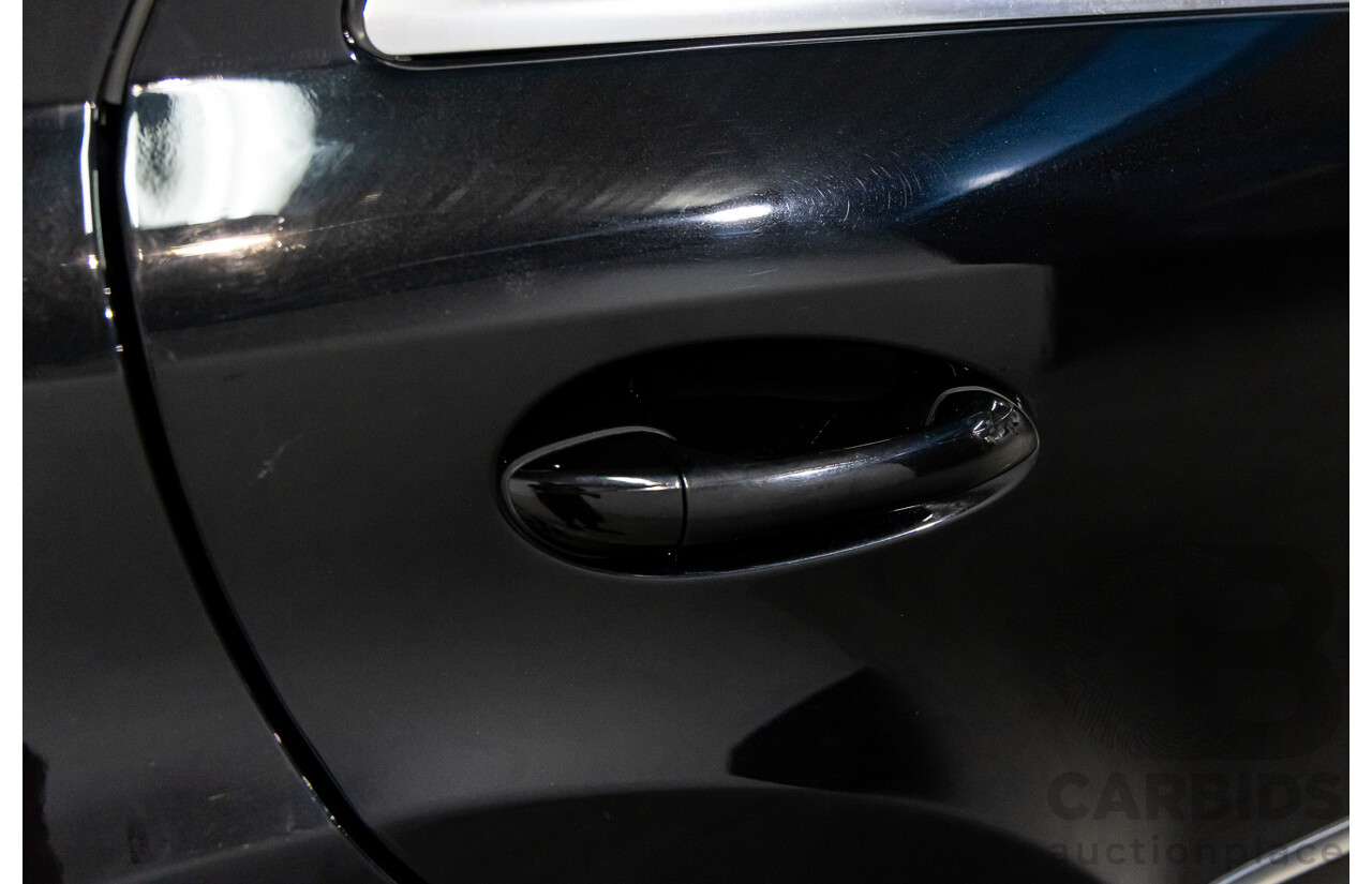 3/2011 Mercedes-Benz ML 300 CDI BlueEfficiency AMG Sports (4x4) 164 MY11 4d Wagon Obsidian Black Metallic Turbo Diesel 3.0L