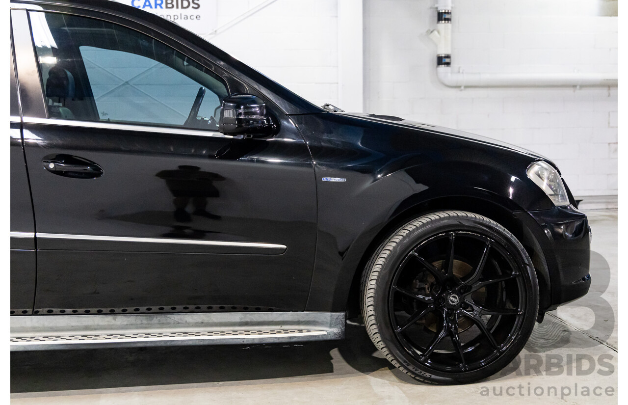 3/2011 Mercedes-Benz ML 300 CDI BlueEfficiency AMG Sports (4x4) 164 MY11 4d Wagon Obsidian Black Metallic Turbo Diesel 3.0L