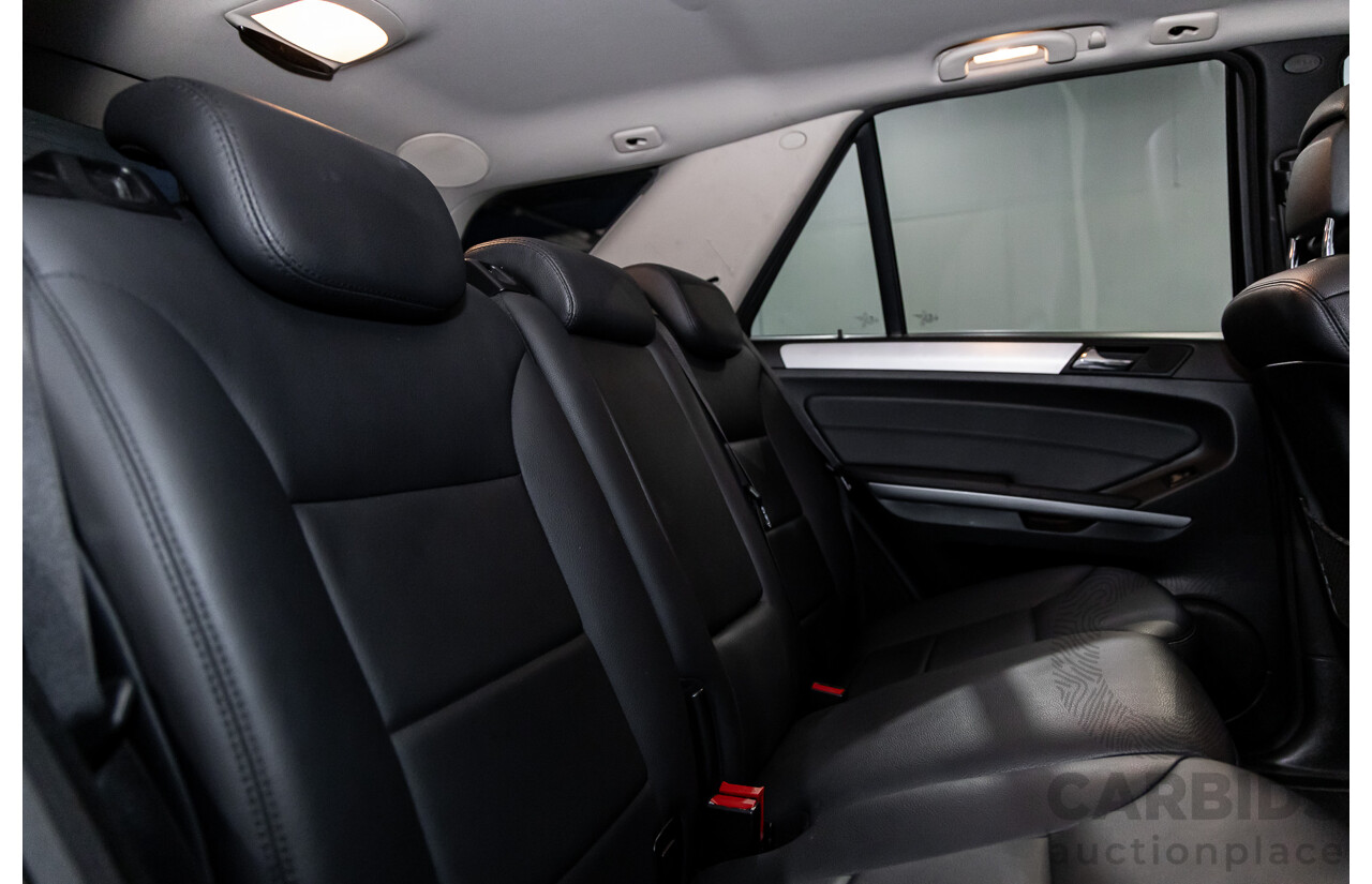 3/2011 Mercedes-Benz ML 300 CDI BlueEfficiency AMG Sports (4x4) 164 MY11 4d Wagon Obsidian Black Metallic Turbo Diesel 3.0L