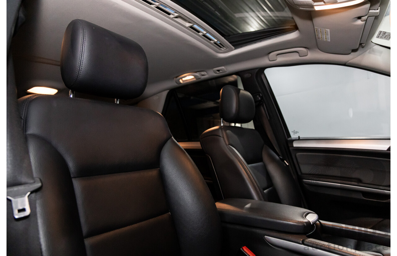 3/2011 Mercedes-Benz ML 300 CDI BlueEfficiency AMG Sports (4x4) 164 MY11 4d Wagon Obsidian Black Metallic Turbo Diesel 3.0L