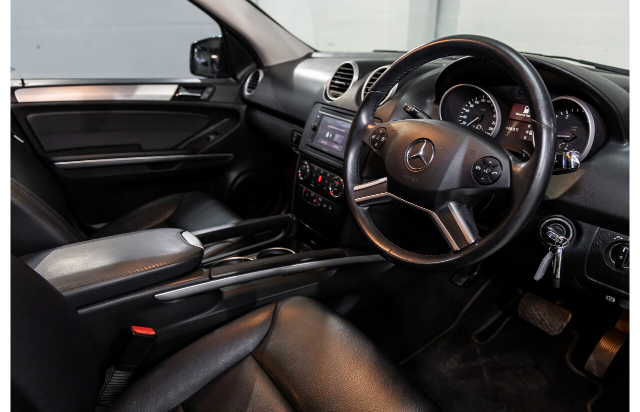 3/2011 Mercedes-Benz ML 300 CDI BlueEfficiency AMG Sports (4x4) 164 MY11 4d Wagon Obsidian Black Metallic Turbo Diesel 3.0L