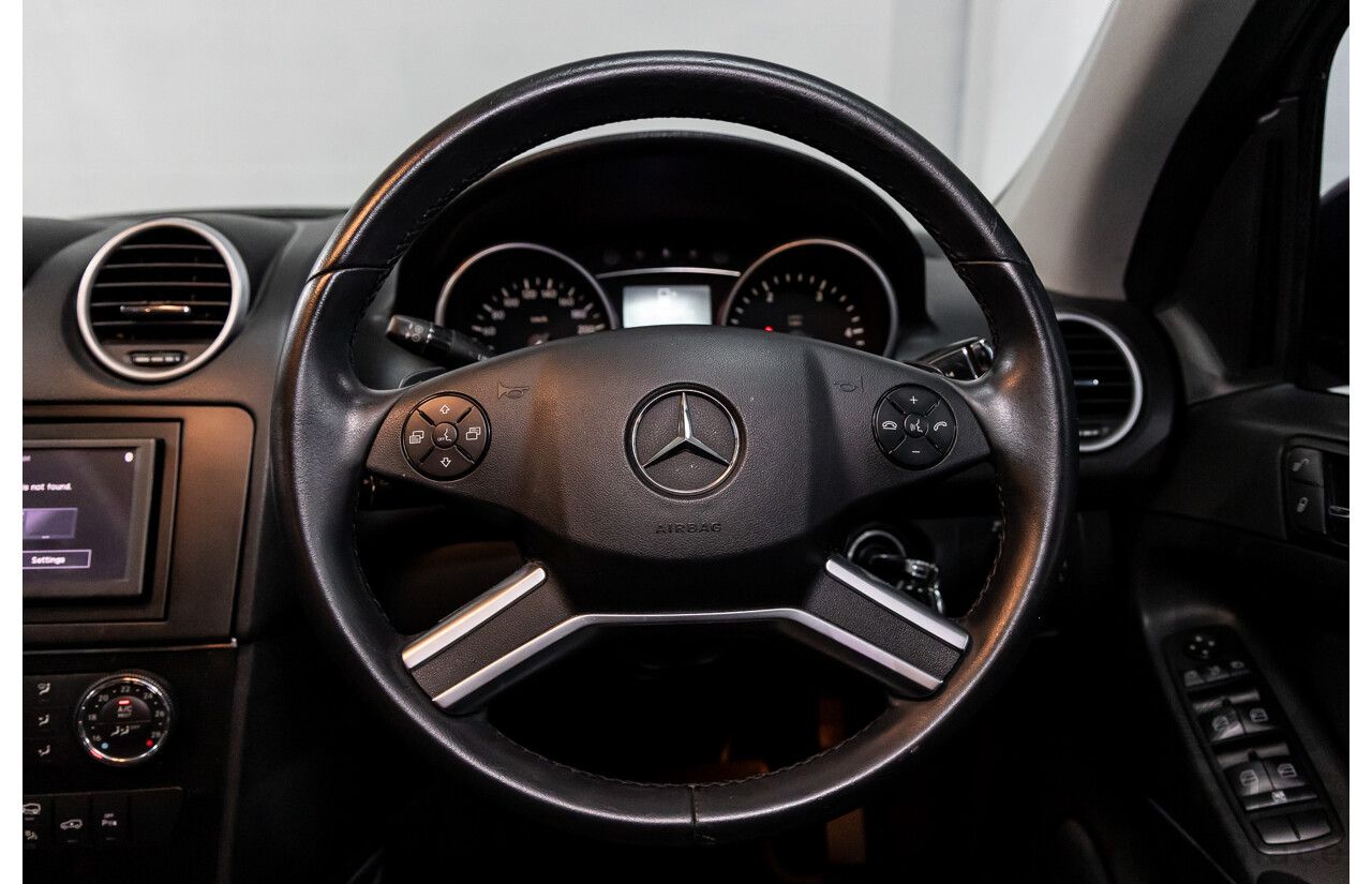 3/2011 Mercedes-Benz ML 300 CDI BlueEfficiency AMG Sports (4x4) 164 MY11 4d Wagon Obsidian Black Metallic Turbo Diesel 3.0L