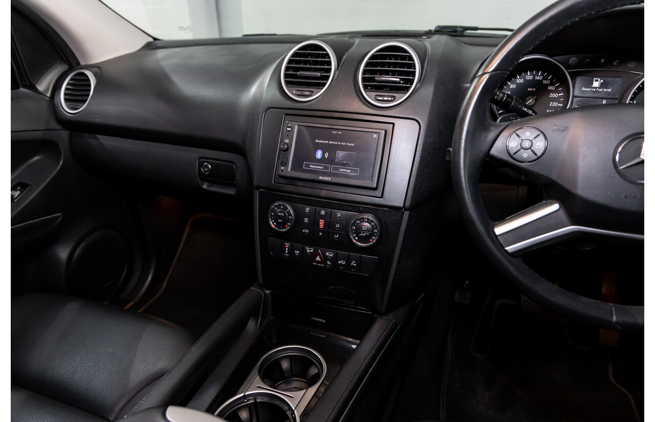 3/2011 Mercedes-Benz ML 300 CDI BlueEfficiency AMG Sports (4x4) 164 MY11 4d Wagon Obsidian Black Metallic Turbo Diesel 3.0L