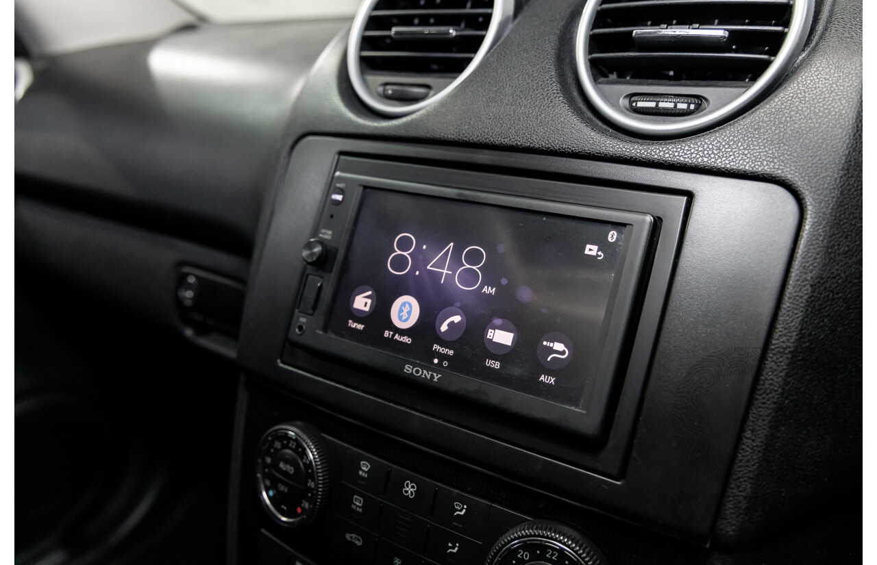 3/2011 Mercedes-Benz ML 300 CDI BlueEfficiency AMG Sports (4x4) 164 MY11 4d Wagon Obsidian Black Metallic Turbo Diesel 3.0L