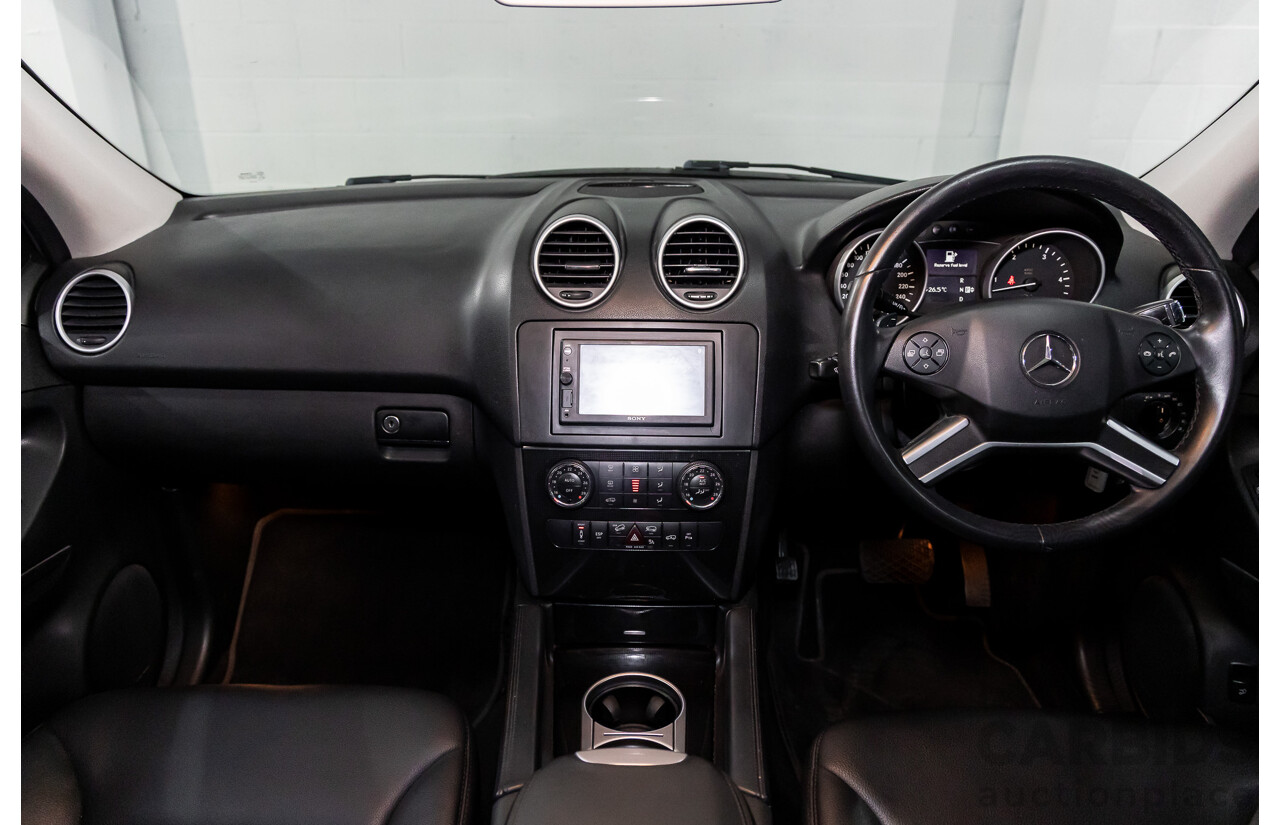 3/2011 Mercedes-Benz ML 300 CDI BlueEfficiency AMG Sports (4x4) 164 MY11 4d Wagon Obsidian Black Metallic Turbo Diesel 3.0L