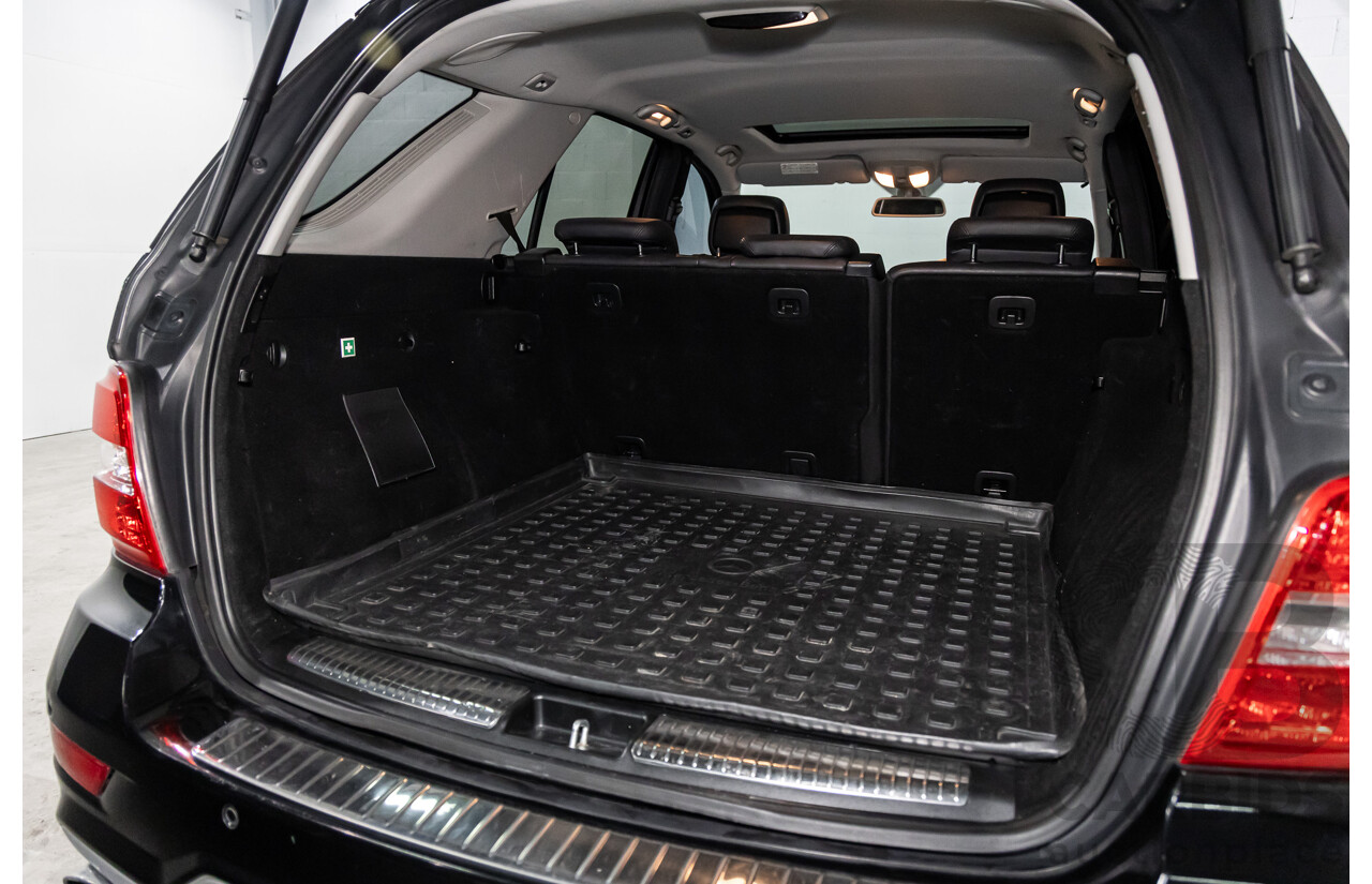 3/2011 Mercedes-Benz ML 300 CDI BlueEfficiency AMG Sports (4x4) 164 MY11 4d Wagon Obsidian Black Metallic Turbo Diesel 3.0L