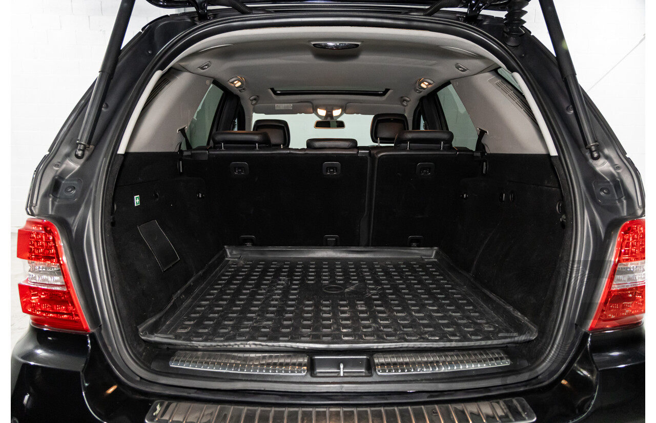 3/2011 Mercedes-Benz ML 300 CDI BlueEfficiency AMG Sports (4x4) 164 MY11 4d Wagon Obsidian Black Metallic Turbo Diesel 3.0L