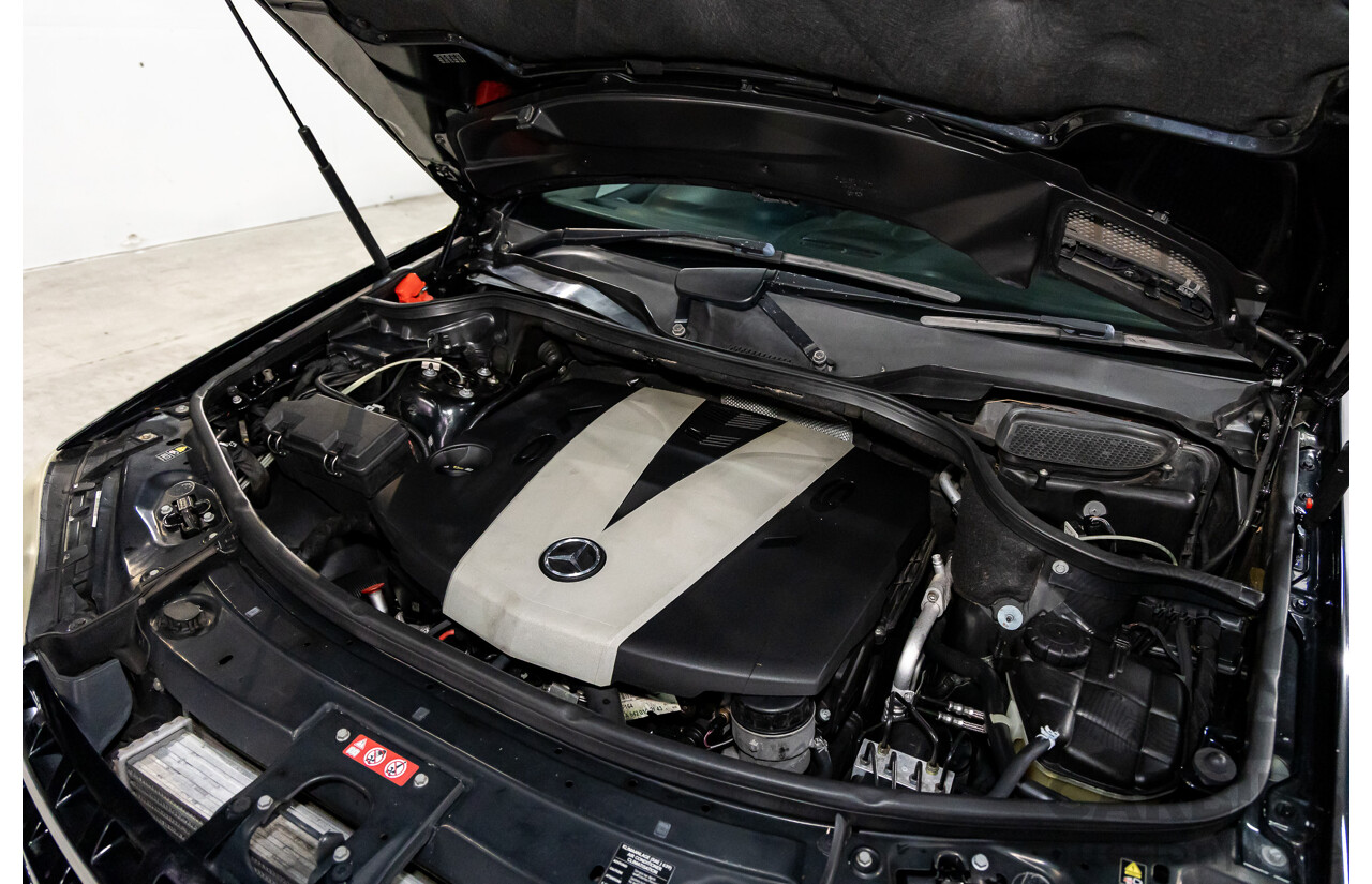 3/2011 Mercedes-Benz ML 300 CDI BlueEfficiency AMG Sports (4x4) 164 MY11 4d Wagon Obsidian Black Metallic Turbo Diesel 3.0L