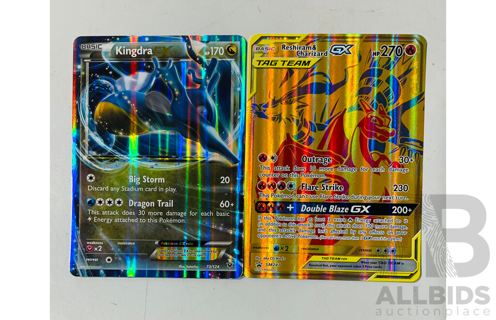 Collection of Oversized and Foil Pokemon TCG Cards Including Pikachu Vmax, Morpeko Vunion, Oversized Reshiram and Charizard Tag Team GX, Oversized Kingdra EX and Much More