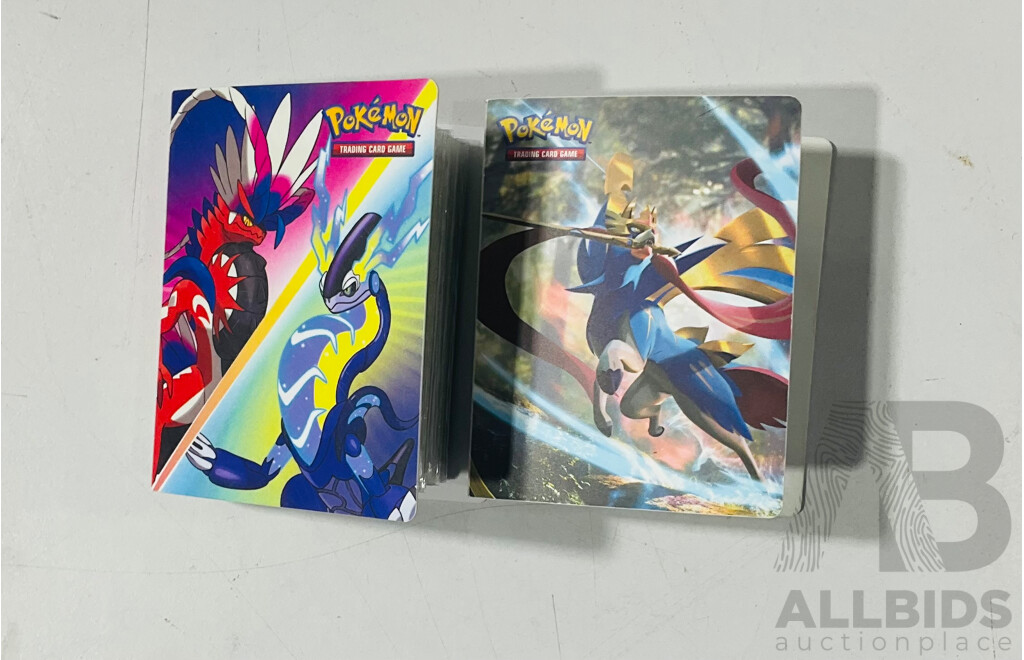 Collection of Oversized and Foil Pokemon TCG Cards Including Pikachu Vmax, Morpeko Vunion, Oversized Reshiram and Charizard Tag Team GX, Oversized Kingdra EX and Much More
