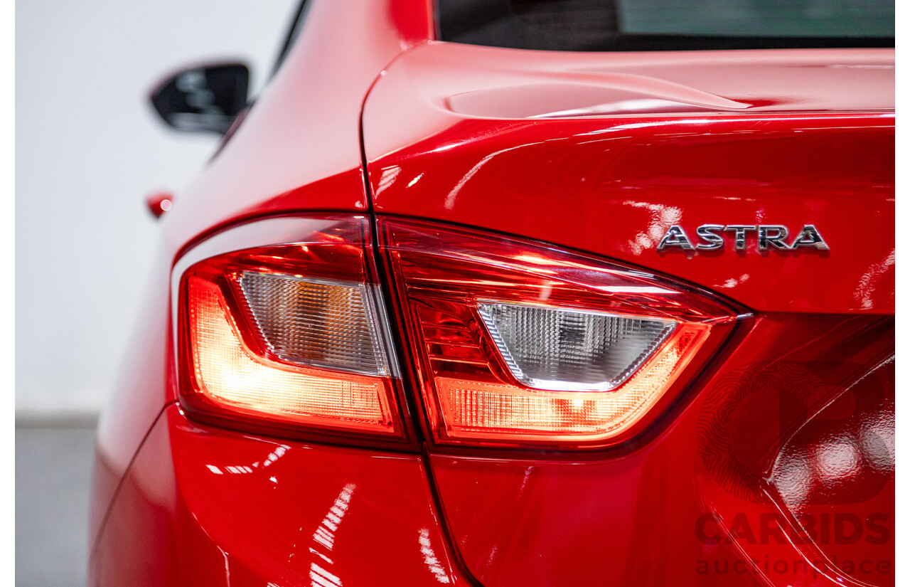 02/2018 Holden Astra LS BL 4d Sedan Absolute Red 1.4L