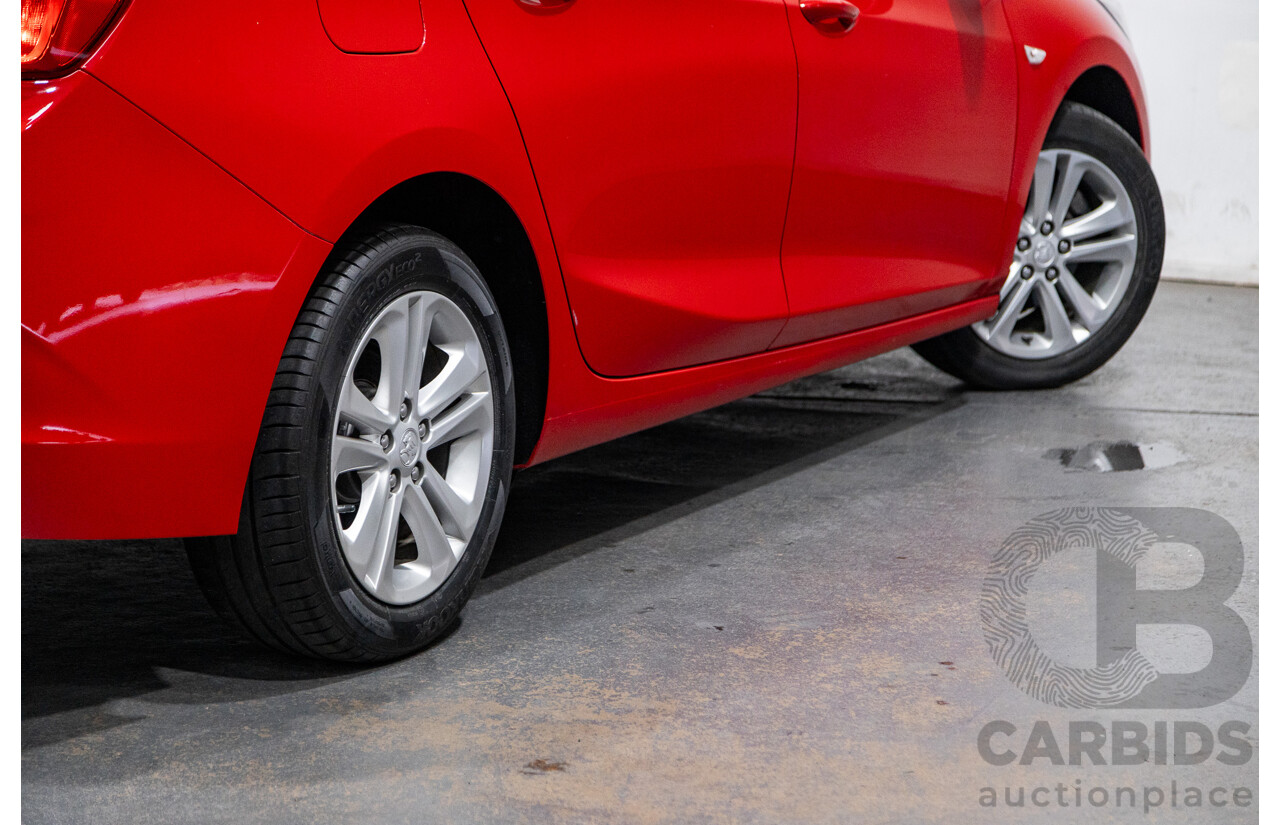 02/2018 Holden Astra LS BL 4d Sedan Absolute Red 1.4L