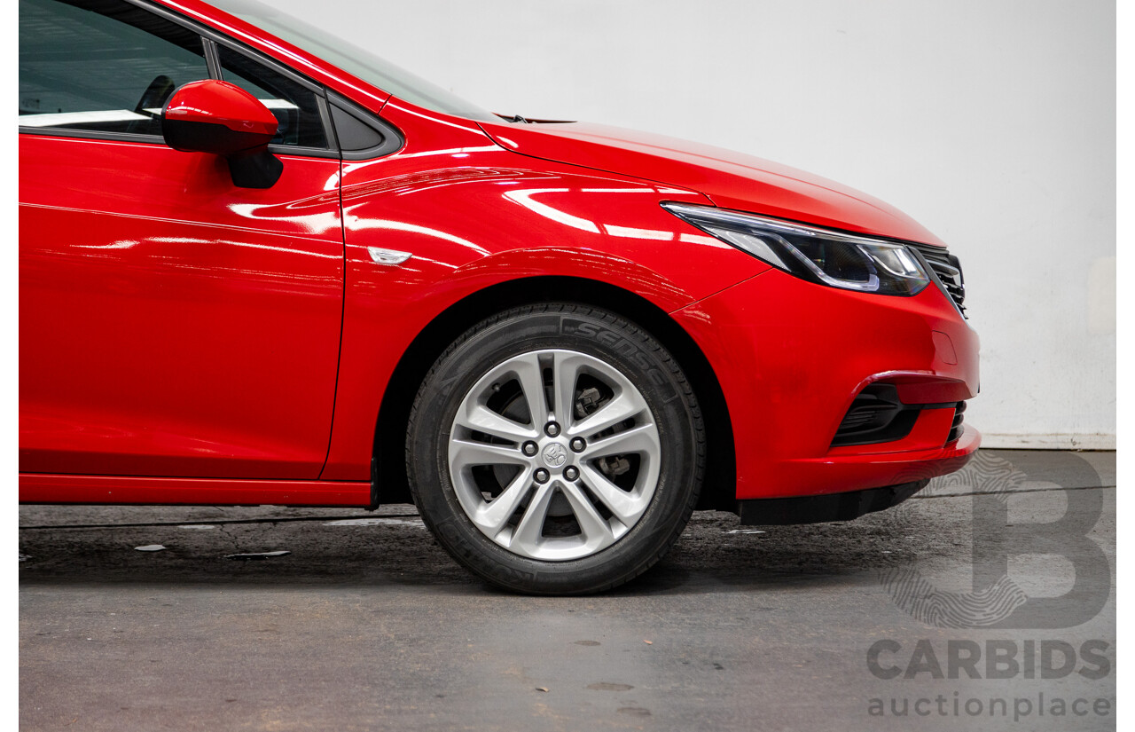 02/2018 Holden Astra LS BL 4d Sedan Absolute Red 1.4L