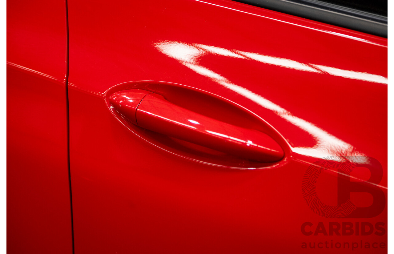 02/2018 Holden Astra LS BL 4d Sedan Absolute Red 1.4L