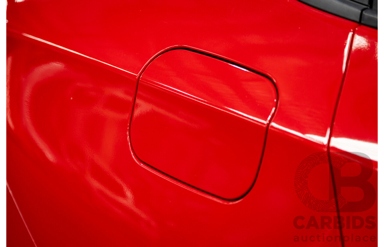 02/2018 Holden Astra LS BL 4d Sedan Absolute Red 1.4L