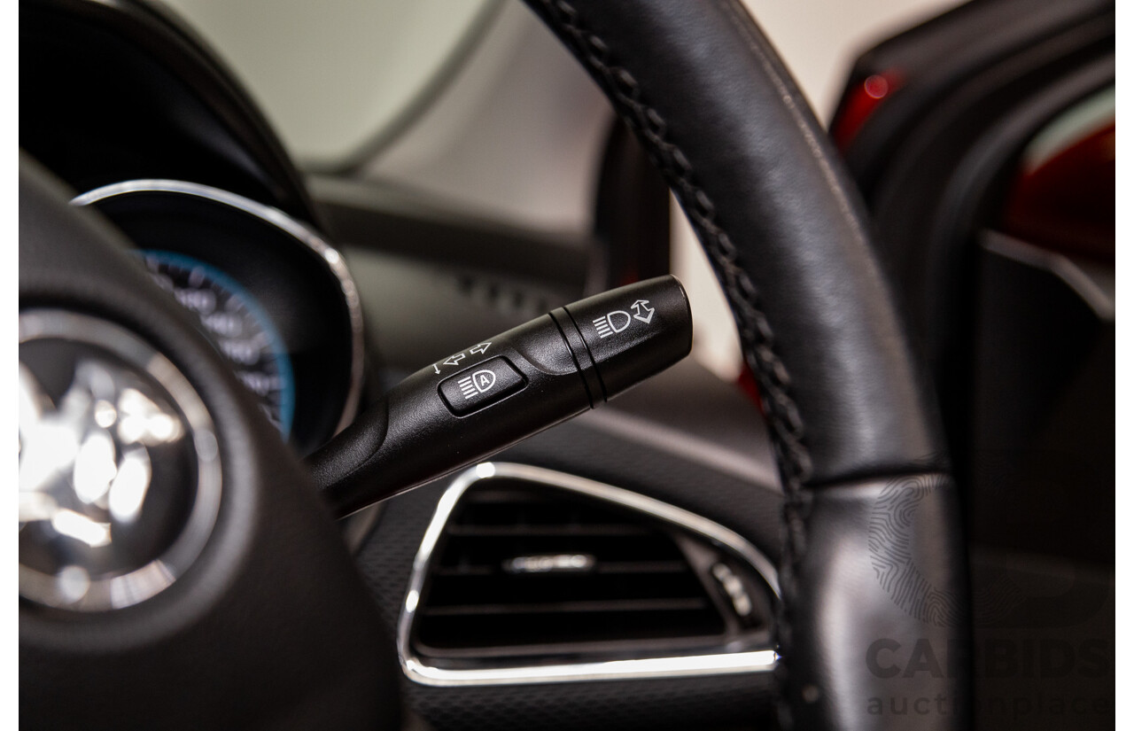 02/2018 Holden Astra LS BL 4d Sedan Absolute Red 1.4L