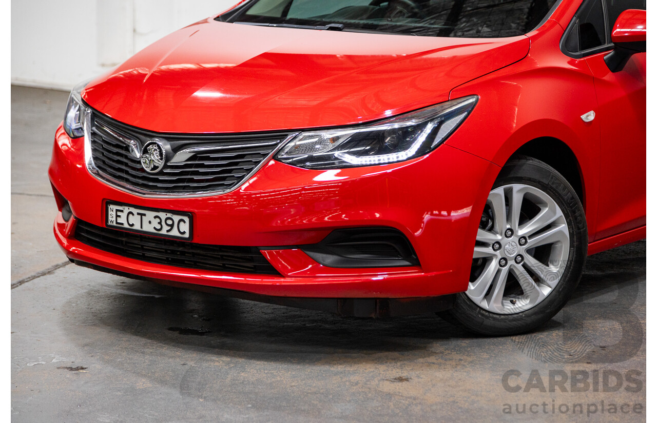 02/2018 Holden Astra LS BL 4d Sedan Absolute Red 1.4L