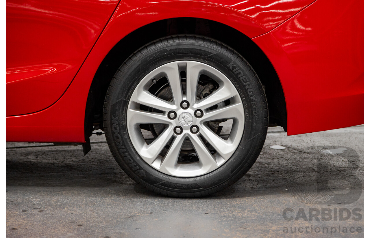 02/2018 Holden Astra LS BL 4d Sedan Absolute Red 1.4L