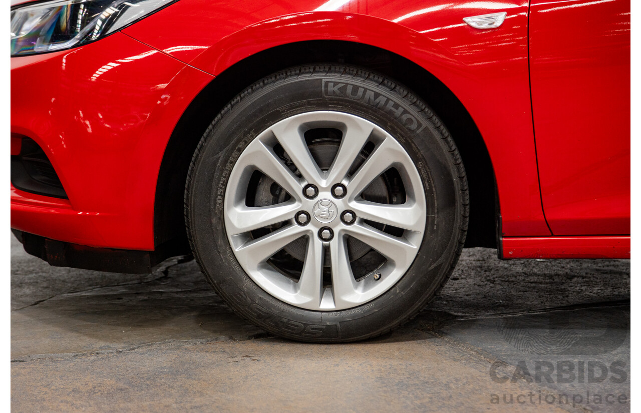 02/2018 Holden Astra LS BL 4d Sedan Absolute Red 1.4L