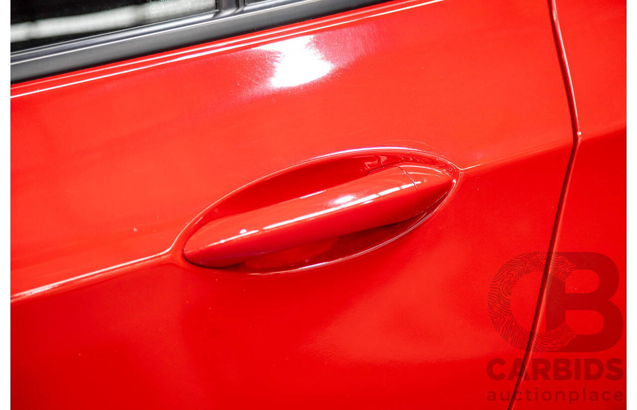 02/2018 Holden Astra LS BL 4d Sedan Absolute Red 1.4L