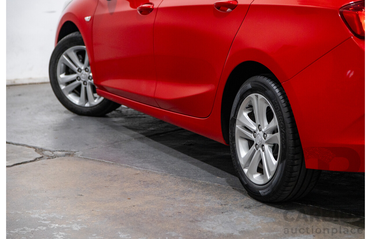 02/2018 Holden Astra LS BL 4d Sedan Absolute Red 1.4L