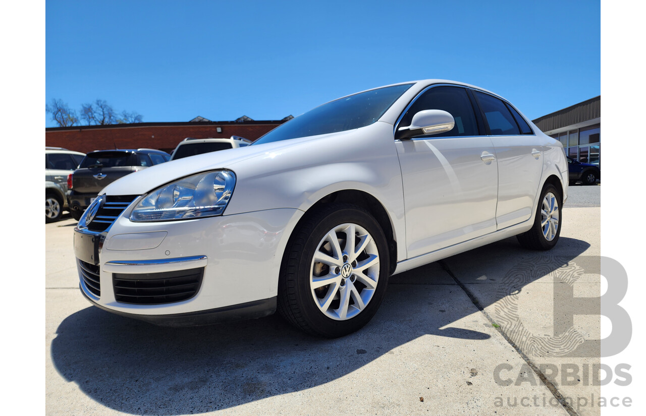 12/2009 Volkswagen Jetta 103 TDI FWD 1KM MY10 4D Sedan White 2.0L