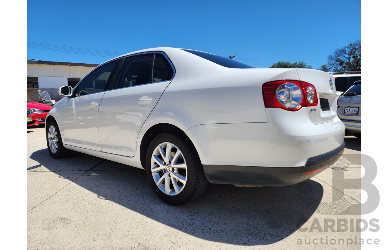 12/2009 Volkswagen Jetta 103 TDI FWD 1KM MY10 4D Sedan White 2.0L