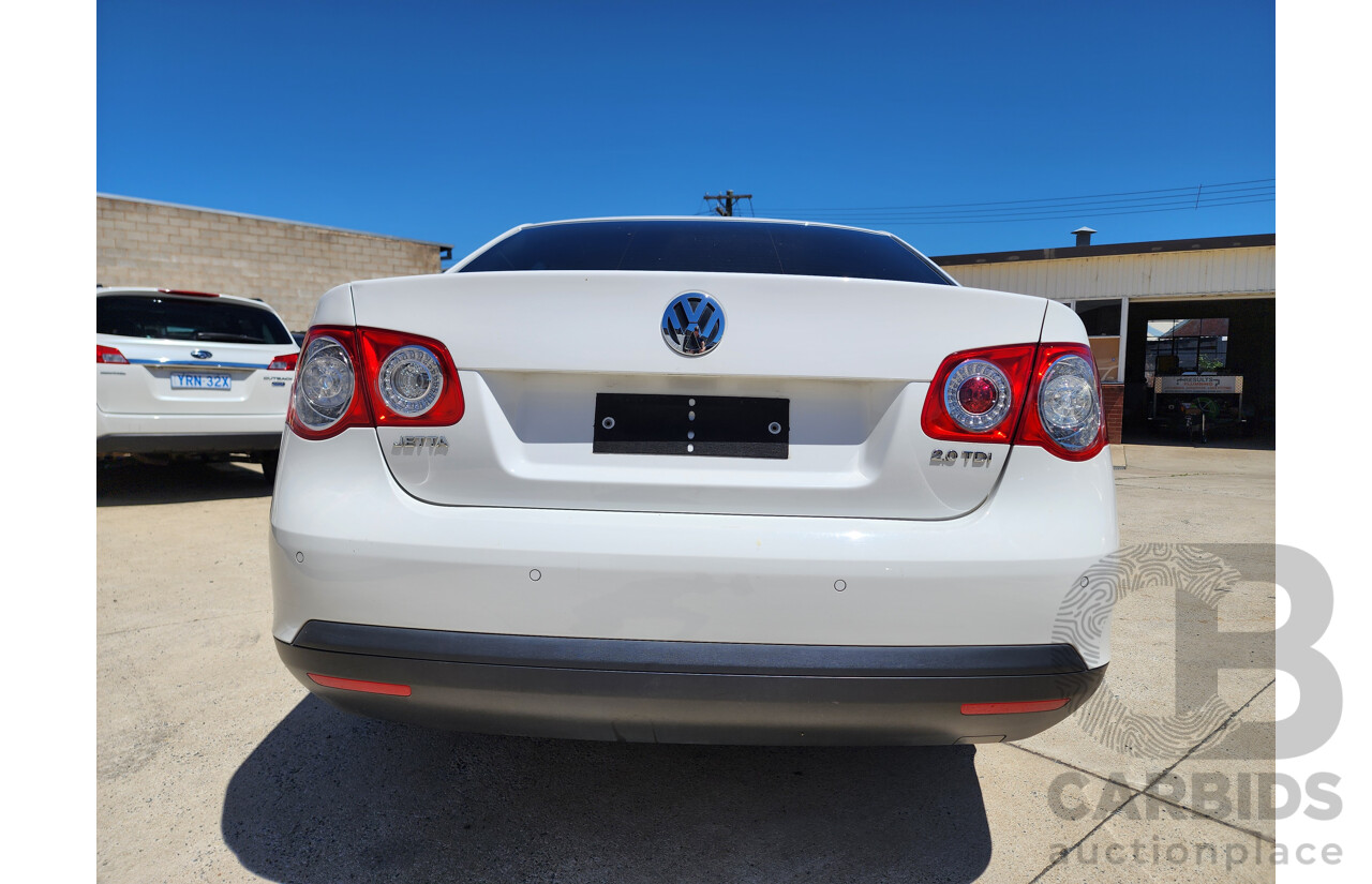 12/2009 Volkswagen Jetta 103 TDI FWD 1KM MY10 4D Sedan White 2.0L