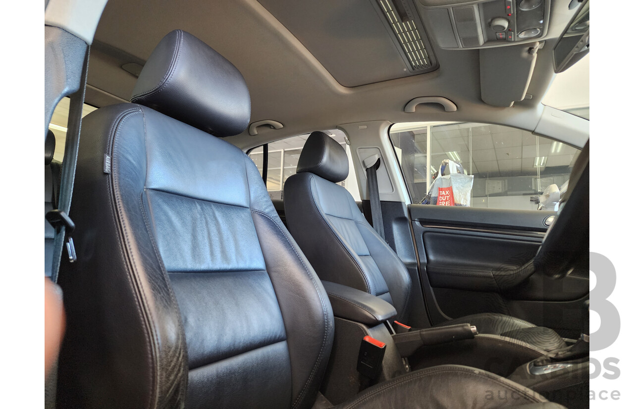 12/2009 Volkswagen Jetta 103 TDI FWD 1KM MY10 4D Sedan White 2.0L