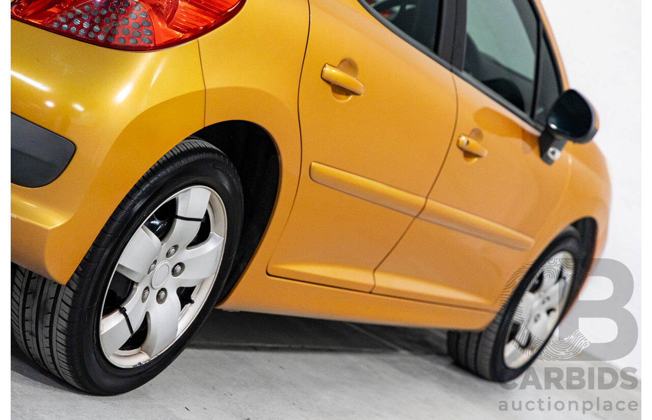 2/2009 Peugeot 207 XT  5d Hatchback Orange Salamanque Metallic 1.6L